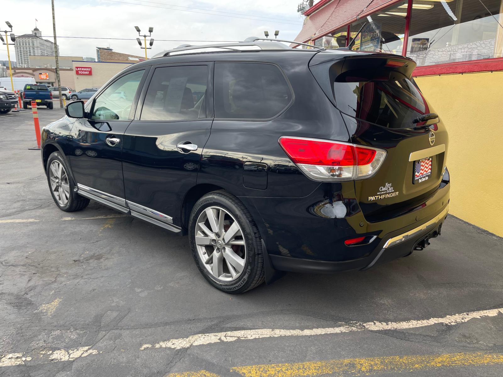 2014 Black /Tan Nissan Pathfinder Platinum (5N1AR2MM1EC) with an 3.5 Liter V6 engine, Automatic transmission, located at 801 South State Street, Salt Lake City, UT, 84111, (801) 328-0098, 40.751953, -111.888206 - Features: 20 Inch Plus Wheels, Power Hatch/Deck Lid, 4WD/AWD, Premium Package, A/C Seat(s), Rear Air Conditioning, Alloy Wheels, Rear Entertainment System, BOSE Sound System, Rear Seat Heaters, Bluetooth Technology, Rear View Camera, Fold-Away Third Row, Remote Start, Front Seat Heaters, Satellite R - Photo #7